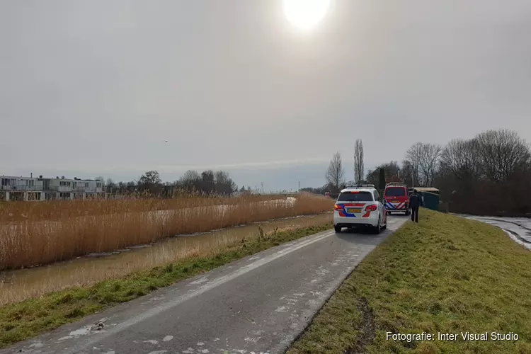 Hond en eigenaresse te water in Purmerend